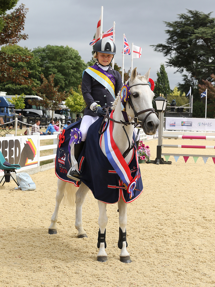 Ellie Burrell-Squibb riding Kitty, winners of the Bronze League 128cm Final © 1st Class Images