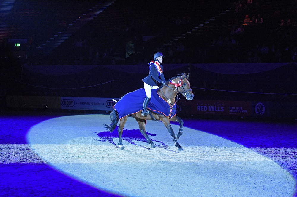 Laura Pritchard after winning the Senior Foxhunter Championship at the Horse of the Year Show 2016. © ES Photography